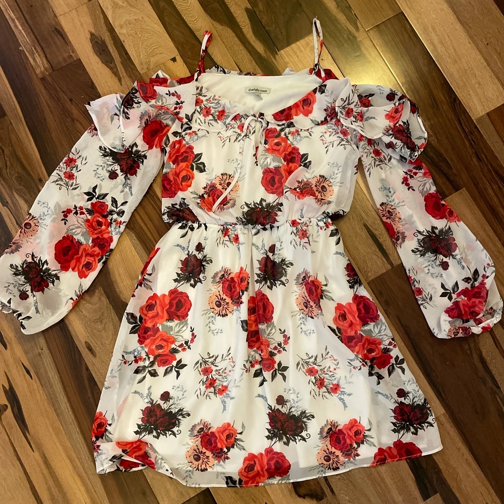 Light weight material dress, with cutout shoulders and spaghetti strap.